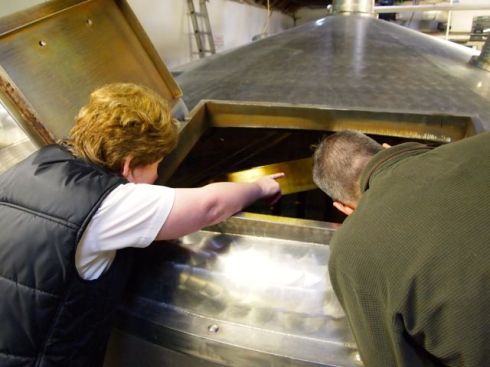 Justin and our wonderful tour guide at the Glen Garioch distillery are checking out the mash tun.